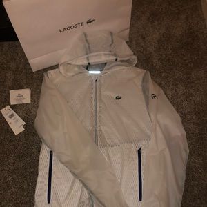 Men’s small, white, Lacoste windbreaker.
